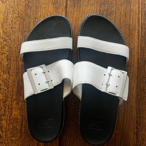 sorel black and white slide on sandals